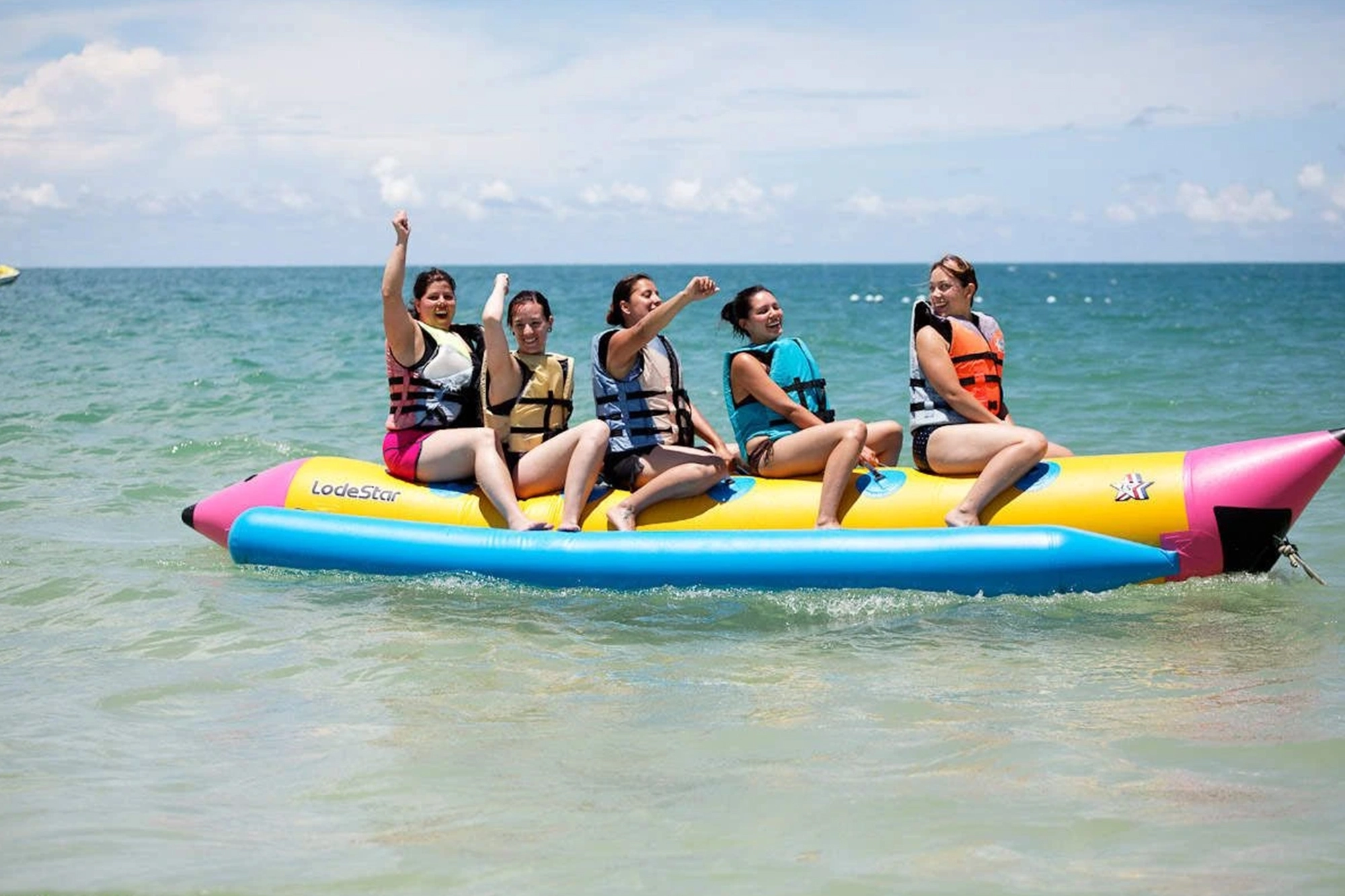 Watersports activities including snorkeling and diving at Nusa Dua Bali beach