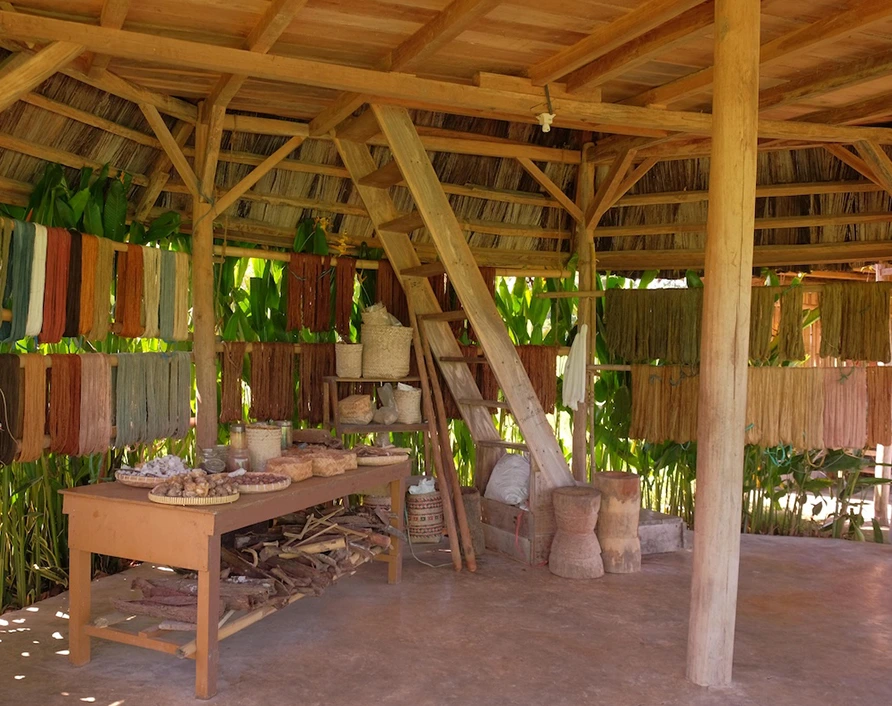 Weaving House – explore traditional weaving techniques in Flores Village, learn about local culture, and see artisans crafting vibrant fabrics during your Flores Komodo Tour from Labuan Bajo.